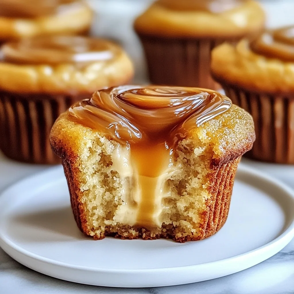 Pumpkin Cheesecake Muffins with Caramel Swirl